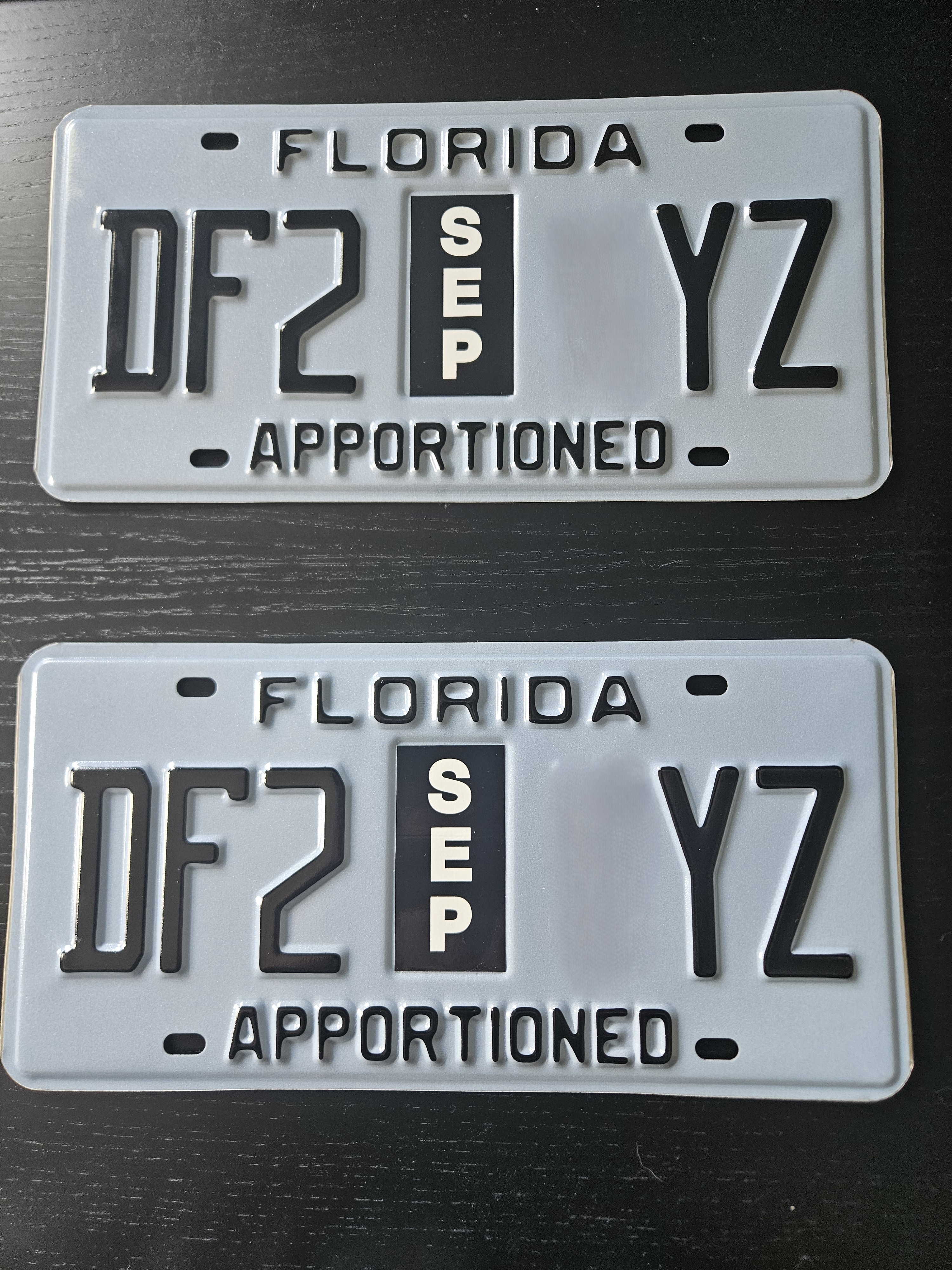 Dos placas apportioned de Florida de un caso real